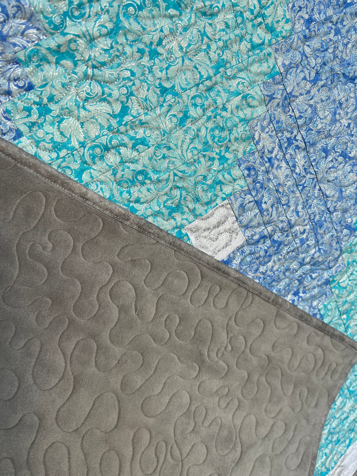 Log cabin style metallic aqua hues